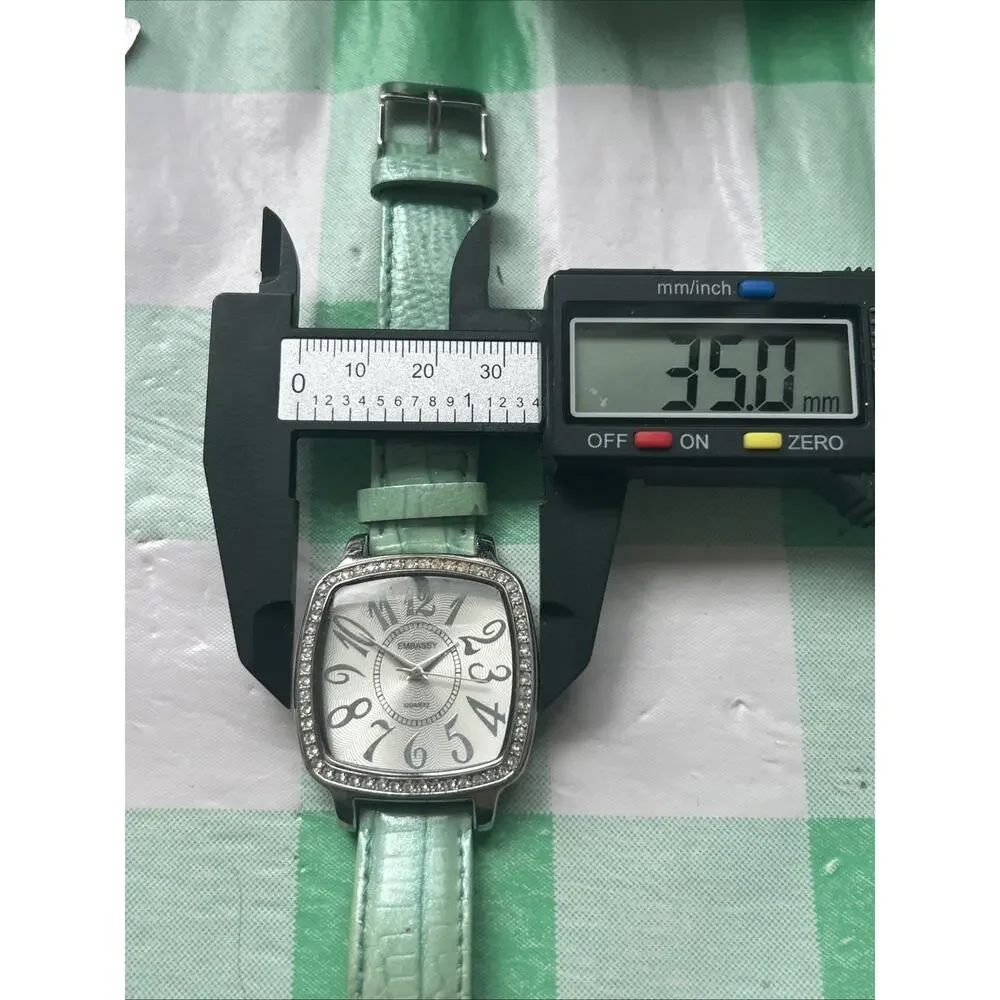 Embassy silver tone